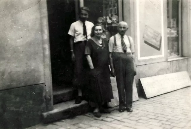 Eva Meislova's husband Jiri Meisl with his parents in front of their shop Eva Meislova's husband Jiri Meisl with his parents in front of their shop
