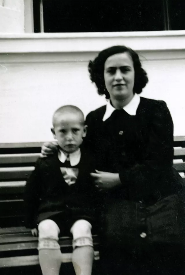 Nisim Navon's aunt Sarina Navon with her child Jakov in front of Nisim's grandparents' house