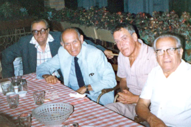 Gavril Marcuson with the former graduates of Spiru Haret High School