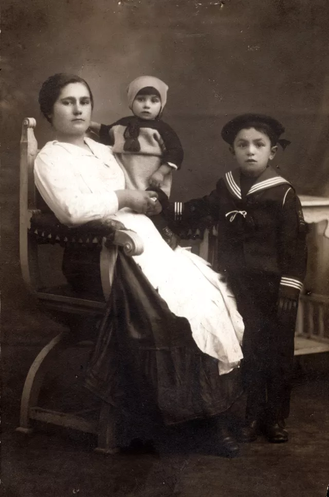 David and Mile Kalef with the woman who took care of them