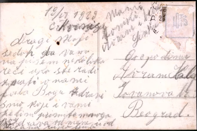 Back of photo of Jakov and Lenka Kalef in a boat