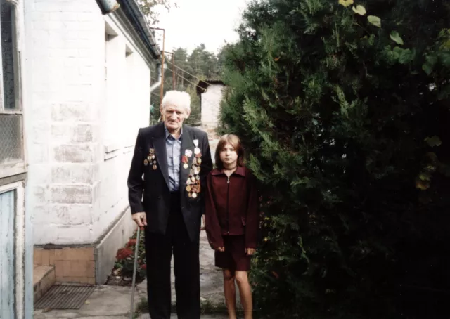 Grigoriy Golod with his granddaughter Grigoriy Golod with his granddaughter