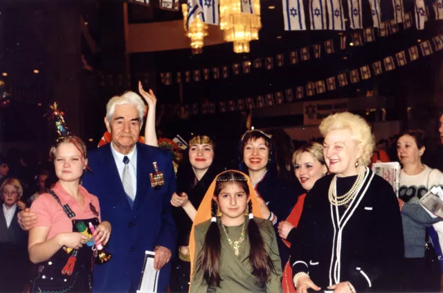 Semyon Nezhynski with his wife Irina Nezhynskaya at a Purim celebration