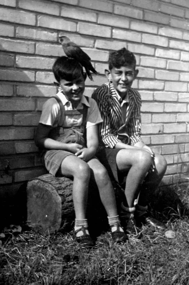 Jiri Munk with his brother Viktor Munk and their pet jackdaw