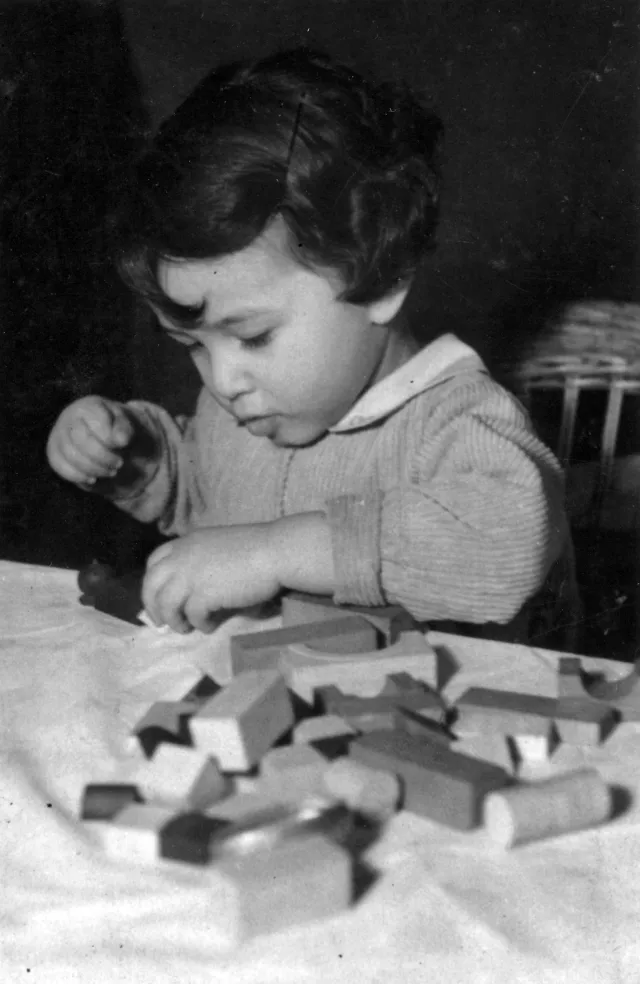 Zuzana Minacova playing with her toys