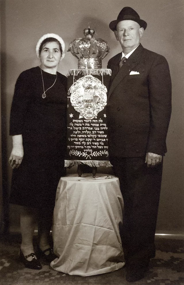 Henryk Prajs and his uncle's wife with the Torah from Gora Kalwaria Henryk Prajs and his uncle's wife with the Torah from Gora Kalwaria