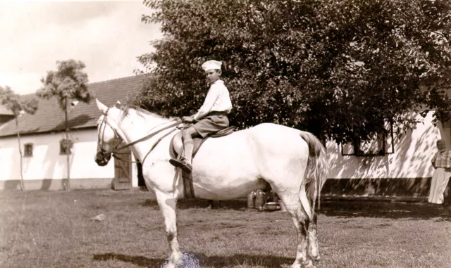 Magdalena Berger's brother Andrija Grossberger riding a horse