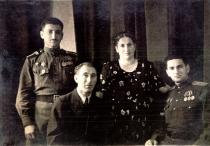 Bella Kisselgof 's aunt, Luba Dohlzhanskaya,
her husband Aron Dohlzhansky and
their sons Ziama and Misha (Mosia, or Mihail) Dohlzhansky Bella Kisselgof 's aunt, Luba Dohlzhanskaya,
her husband Aron Dohlzhansky and
their sons Ziama and Misha (Mosia, or Mihail) Dohlzhansky